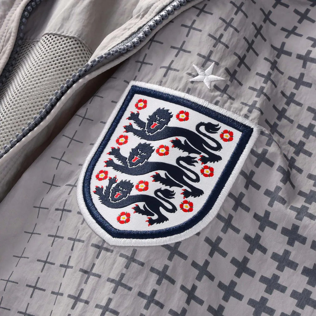 Veste de survêtement Palace x Nike England Solo Swoosh – Gris étain/Gris froid (PE26)