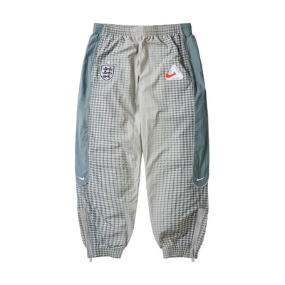 Pantalon de survêtement Palace x Nike England Solo Swoosh – Gris étain/Gris froid (PE26)
